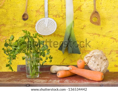food still life: vegetables for the soup + vintage kitchen utensils, slow food