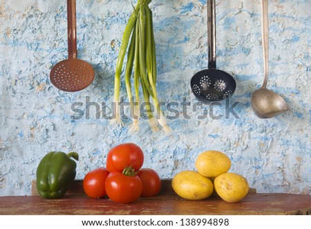 food still life: vegetables + vintage kitchen utensils, slow food