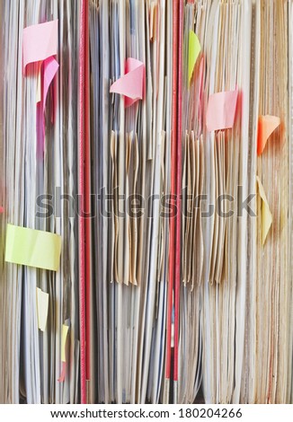 messy documents in file folders, close up