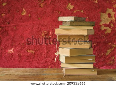 stack of books. grungy background, free copy space