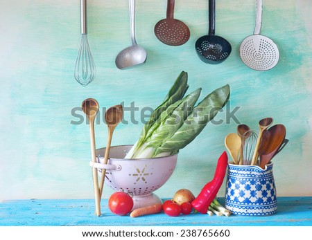 retro kitchen utensils and vegetables, free copy space, cooking concept