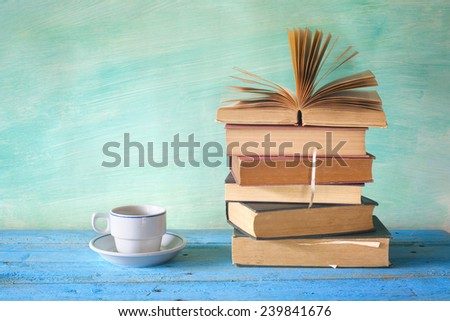 vintage books with a coffee cup, studying, learning, literature concept, copy space