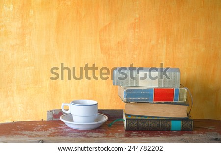 stack of books and a cup of coffee,free copy space