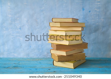 stack of books, grungy background,free copy space