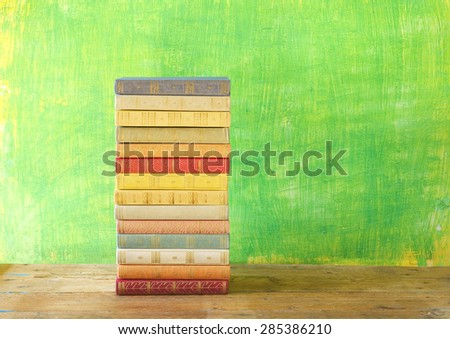 stack of books on grungy background,free copy space