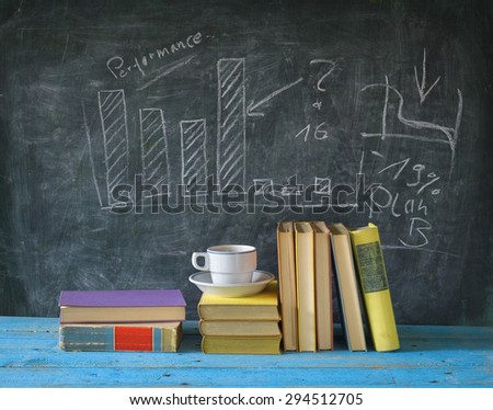 books, cup of coffee, black board, education,learning,science concept,fictional diagram