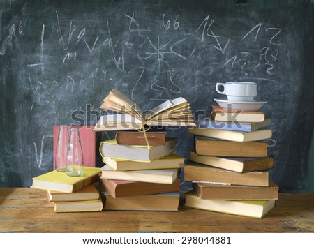 reference books, cup of coffee, blackboard, education,learning,science concept