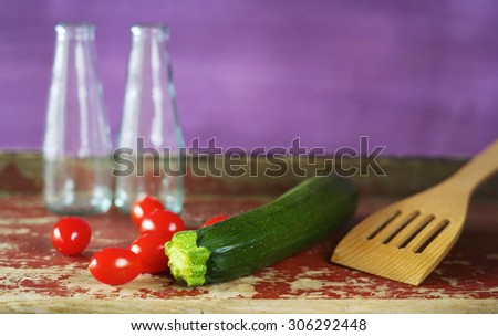 tomatoes,	zucchini ,kitchen utensil,free copy space