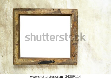 Vintage blank frame, worn, free picture space, free copy space,against grungy wall