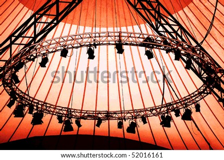 A  circular set of stage lights, for entertainment, or indoor sporting events