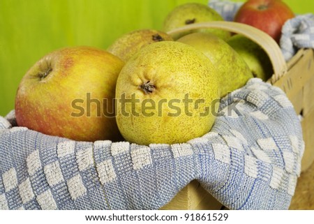 Basket with apples and pears