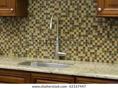 Stainless steel kitchen faucet and sink with mosaic  back splash