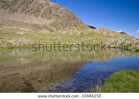 Lago Strino is a small italian alpine lake in val di sole, Trentino. Photo taken with polarizer filter