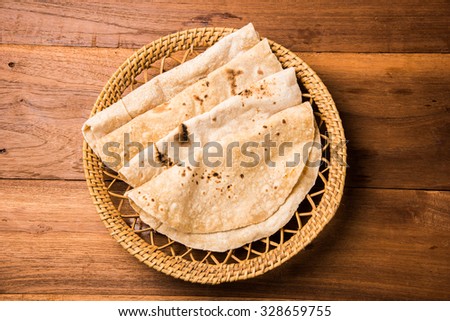 indian roti / chapati / fulka / paratha / indian bread, isolated in a plate