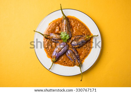 egg plant south indian curry, brinjal curry, brinjal masala also known as baigan masala or baingan masala in India, spicy and tasty dish served with chapati, main course