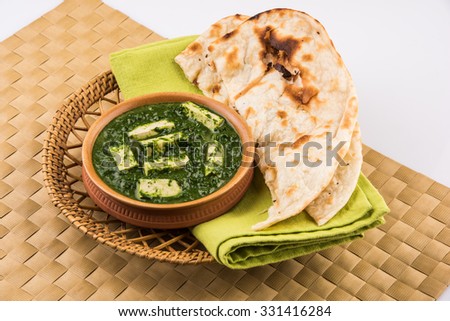 tasty palak paneer served with nan / naan / roti / chapati / fulka / tandoori naan / indian bread
