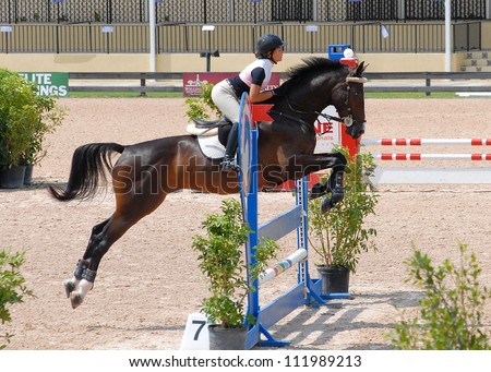 WELLINGTON, FLORIDA - SEPTEMBER 01: An unidentified rider competes at the Equestrian Sports Productions\' ESP Labor Day event on September 1, 2012 in Wellington, Florida.