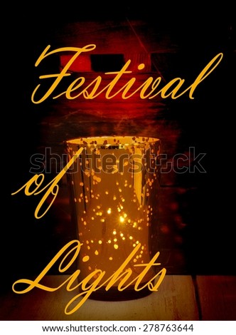 Low key image of a golden glass candle holder with many points where light can come through. Rustic wood textures below and behind the candle pick up the warm tones. Message of Festival of lights