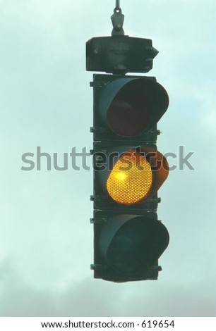 Traffic light with caution yellow light illuminated