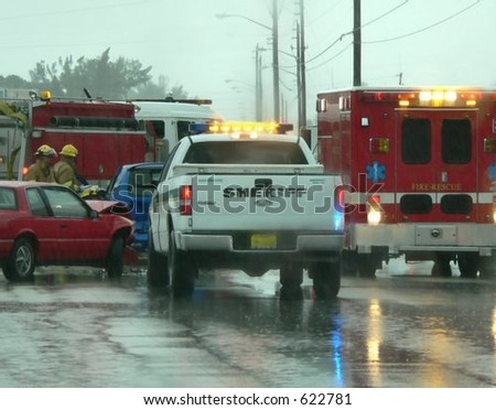 Scene from auto accident on rainy day