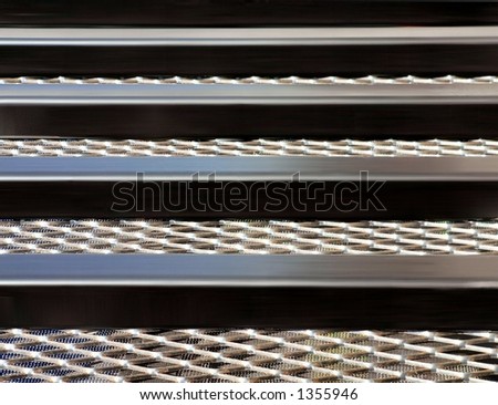 Detail of heavy metal fencing creating industrial abstract