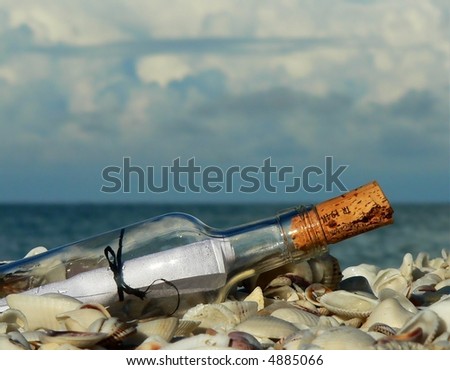 Message in a bottle washed up on seashore