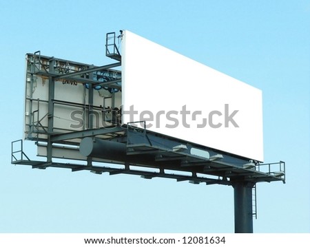 Blank billboard with superstructure showing.  Typical outdoor advertising as seen near highways with a clear blue sky. Copy space in the sky as well as on the billboard. Horizontal orientation.