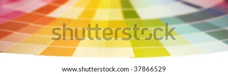 Banner shaped close up of paint selection color wheel with narrow depth of field