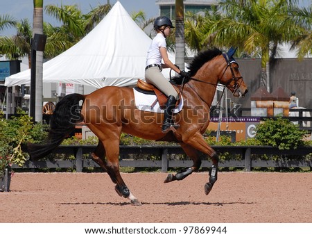 WELLINGTON, FLORIDA - MAR 10: Charlotte Jacobs and Soleil on the flat while competing in the SFla SportChassis Low Junior Jumper class at WEF on March 10, 2012, in Wellington, Florida.