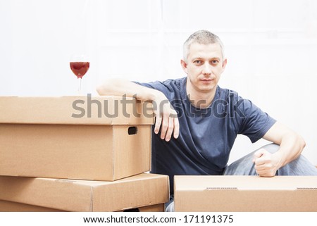 handsome, men with card boxes, in move