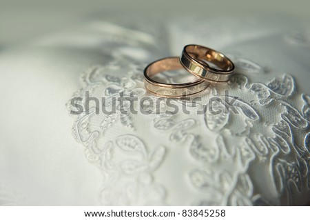 Wedding rings on cushion