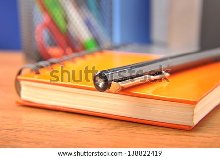 Close-up Notepad cover and pen