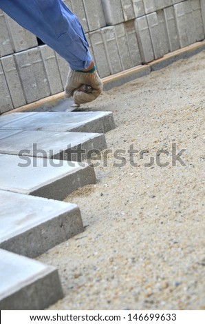Municipal construction workers paving
