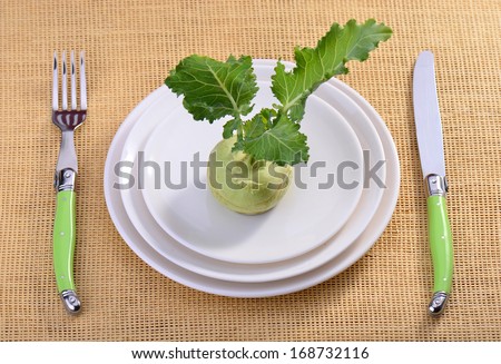 kohlrabi on plate. Raw food diet concept.
