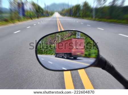 Rear View Mirror Reflecting Road,Truck driving
