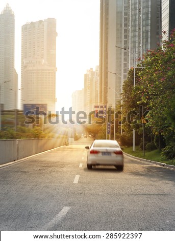 Urban road with sunset