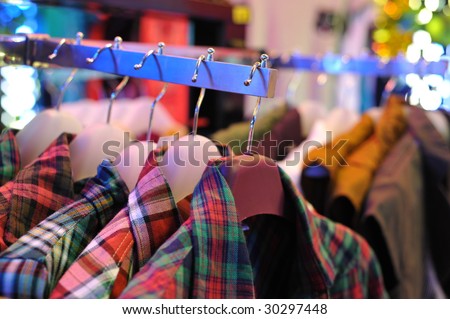 On clothing shop clothes rack's clothes