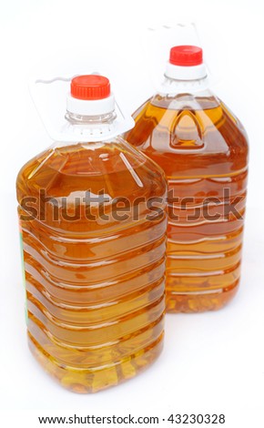 Two Plastic bottle with peanut oil isolated over white