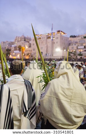 Religious Jews sunrise prayer service at the Western Wall, Jerusalem, Israel