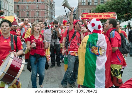 GDANSK. POLAND - JUNE 14: Spanish football fans on the streets of Gdansk, before the match group with Ireland.  June 14, 2012. Gdansk, Poland.