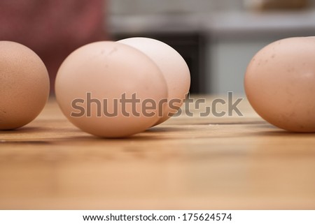 Eggs. Preparing traditional Polish crunch cakes called Faworki or Chrust.