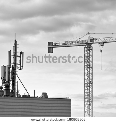 GDANSK, POLAND - FEBRUARY 23, 2014: Construction cranes in operation. View of the district of Gdansk-Zaspa.