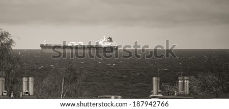 GDANSK BRZEZNO, POLAND - APRIL 15, 2014: Beautiful view from the window of the Gulf of Gdansk. On the photo, vessels standing on the Reda in Gdansk.