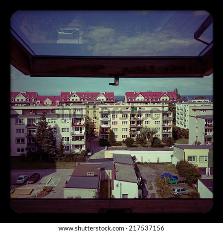 View from the window. Cityscape on the aesthetic Holga Lomography.