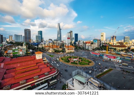 HO CHI MINH, VIETNAM - AUGUST 12, 2015. Downtown Saigon and Quach Thi Trang park in sunset, Ho Chi Minh city, Vietnam. Ho Chi Minh city (aka Saigon) is the biggest city in Vietnam.
