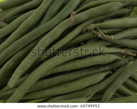 Green organic runner beans  with no background.