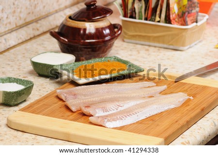 Meal preparation on kitchen from a fish