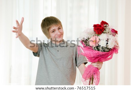 good-natured young man with a bouquet of flowers