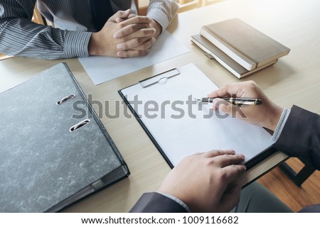 Job interview, Young attractive executives man asking questions to applicant about work history, colloquy dream,  Skill, expertise, experience and businessman listen to candidate answers.