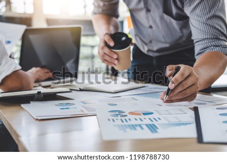 Business colleagues meeting to conference professional investor working a new marketing business strategy project discussion and analysis data chart and graph, finance and accounting concept.